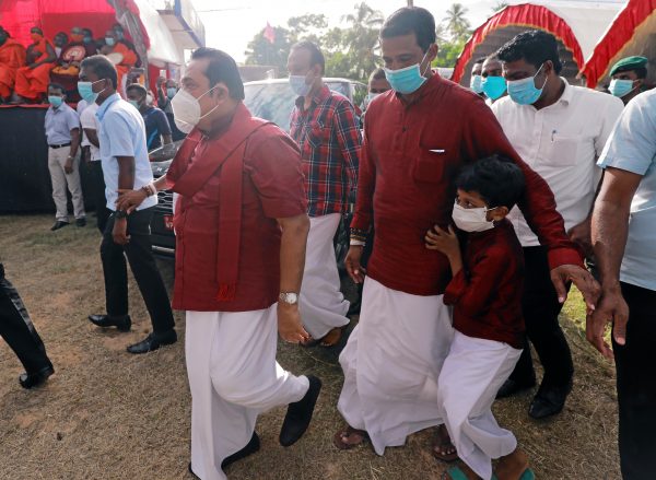 Leader of Sri Lanka People's Front party and Prime Minister Mahinda Rajapaksa, wearing a protective mask, arrives at a campaign rally ahead of country's parliamentary elections in Ahungalla, Sri Lanka, 1 August 2020 (Photo: Reuters/Dinuka Liyanawatte).
