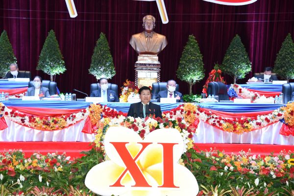 Laos' Prime Minister Thongloun Sisoulith (C) who was named as new secretary general of Laos Communist Party speaks at the closing ceremony of the 11th national congress of the communist party of Laos in Vientiane, Laos, 15 January 2021 (Photo: Reuters).