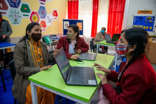 Students interacting with their teachers during the inauguration of the Atal Tinkering Lab in New Delhi, India, 17 December 2020 (Photo: Reuters/Pradeep Gaur).