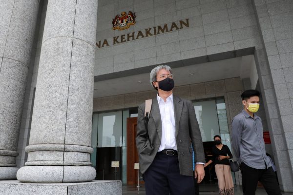 Malaysiakini's editor-in-chief Steven Gan leaves the Federal Court in Putrajaya, Malaysia, 19 February, 2021 (Photo: Reuters/Lim Huey Teng).