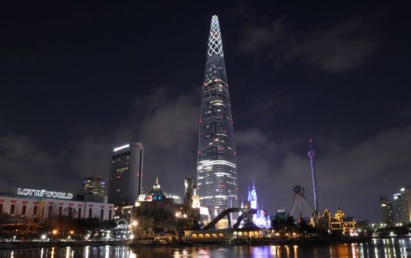 The 123-story Lotte World Tower building in eastern Seoul is illuminated on 17 February 2020 (Photo: Reuters).