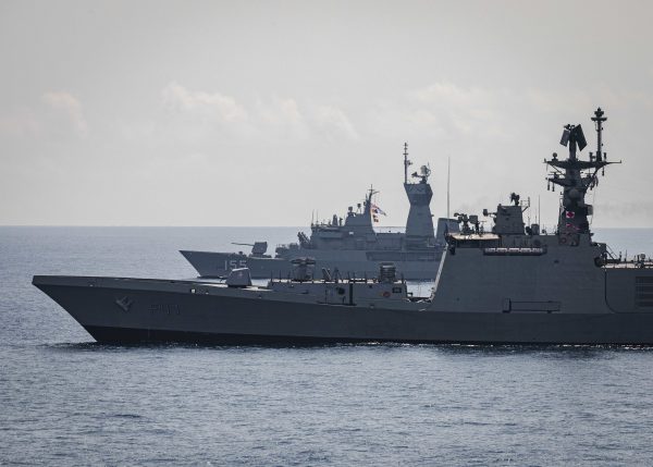 The Australian frigate Ballarat and Indian Navy destroyer Shivalik, foreground, seen from the deck of USS John S. McCain during the Malabar 2020 exercise in the Indian Ocean in November 2020. The Biden administration’s priority on alliance partners will give Australia an opportunity to reset its regional policy (Photo: MC2 Markus Castaneda/US Navy photograph).