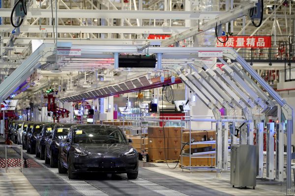 Tesla China-made Model 3 vehicles are seen during a delivery event at its factory in Shanghai, China, 7 January 2020 (Photo: Reuters/Aly Song).