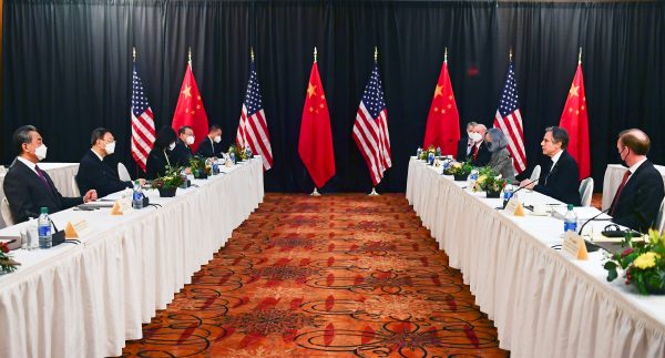 US Secretary of State Antony Blinken (2nd R), joined by National Security Advisor Jake Sullivan (R), speaks while facing Yang Jiechi (2nd L), director of the Central Foreign Affairs Commission Office, and Wang Yi (L), China's State Councilor and Foreign Minister, at the opening session of US-China talks in Anchorage, Alaska, 18 March 2021 (Photo: Frederic J Brown/Pool via Reuters).