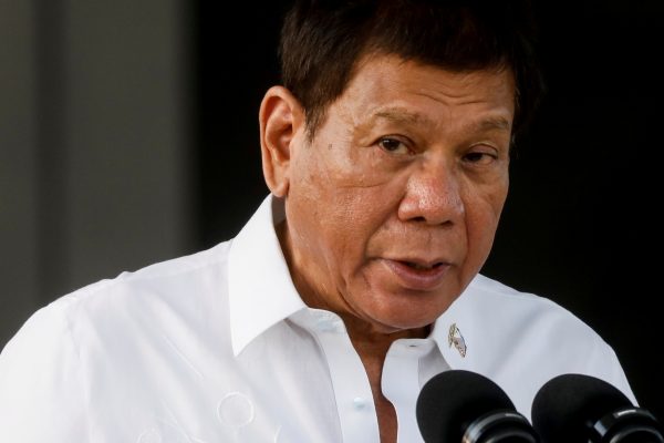 Philippine President Rodrigo Duterte speaks during the arrival ceremony for the first COVID-19 vaccines to arrive in the country in Manila, Philippines, 28 February 2021 (Photographer: Reuters/Eloisa Lopez).