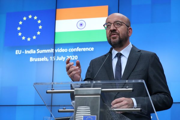European Council President Charles Michel, Ursula von der Leyen and Indian Prime Minister Narendra Modi are seen on the monitor as they take part in a virtual summit, Brussels, Belgium, 15 July 2020 (Photo: Reuters/Yves Herman/Pool).