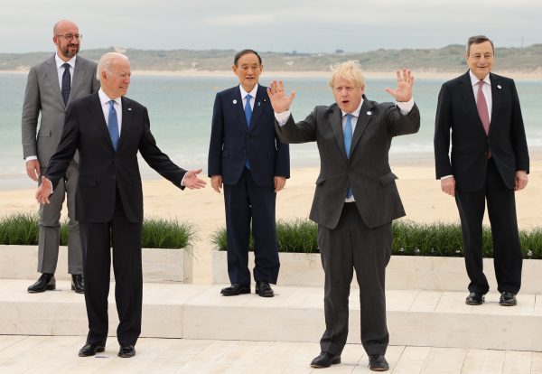 European Council President Charles Michel, U.S. President Joe Biden, Japan's Prime Minister Yoshihide Suga, Britain's Prime Minister Boris Johnson and Italy's Prime Minister Mario Draghi leave after taking a family photograph of the G7 summit in Carbis Bay, Cornwall, England on 11 June 2021 (Photo: Reuters/The Yomiuri Shimbun).