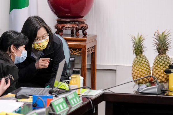 Taiwanese President and chairwoman of the DPP Tsai Ing-Wen, seen pointing at a pineapple during a press conference at the Democratic Progressive Party (DPP) office. In response to China's ban on exports of Taiwan-grown pineapples, the Taiwan government has been promoting local products based on home grown pineapples, Taipei, Taiwan, 3 March 2021 (Photo: Reuters).