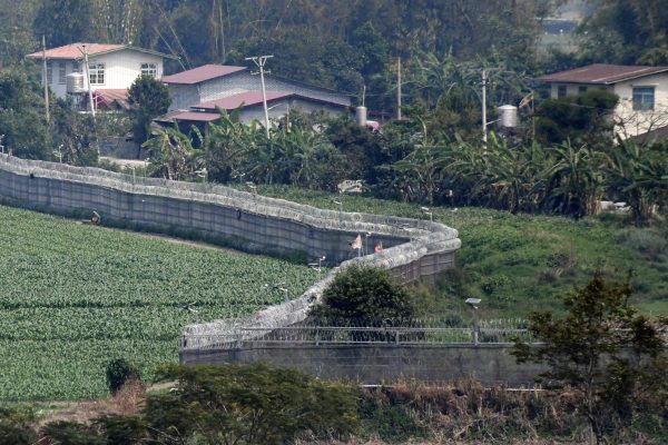 Border area between Ruili in China's Yunnan Province (front) and Myanmar (back), March 27, 2021 (Photo: Kyodo via Reuters Connect).