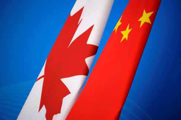 Flags of Canada and China are placed for the first China-Canada economic and financial strategy dialogue in Beijing, China, 12 November 2018 (Photo: Reuters/Jason Lee/Pool).