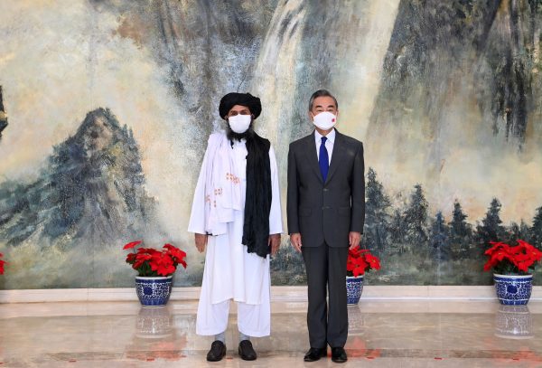 Chinese State Councilor and Foreign Minister Wang Yi meets with Mullah Abdul Ghani Baradar, political chief of Afghanistan's Taliban, in Tianjin, China 28 July 2021 (Photo: Li Ran/Xinhua/Reuters).