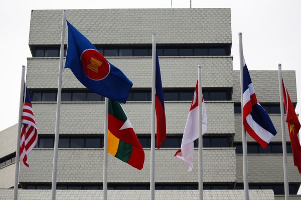 Flags are seen outside the Association of Southeast Asian Nations (ASEAN) secretariat building, ahead of the ASEAN leaders' meeting in Jakarta, Indonesia, 23 April 2021 (Photo: Willy Kurniawan/Reuters).