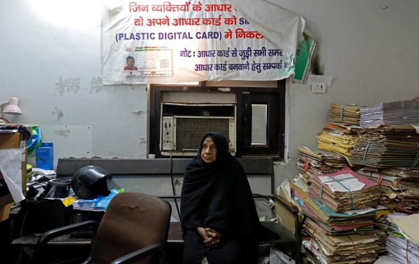 A woman waits for her turn to to enrol for the Unique Identification (UID) database system, also known as Aadhaar, at a registration centre in New Delhi, India, 17 January 2018 (Photo: Saumya Khandelwal/ Reuters).