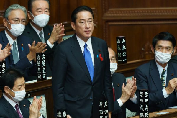 Japan's New Prime Minister Fumio Kishida is applauded after being elected new Prime Minister during the extraordinary session at Lower House of parliament in Tokyo, Japan, 4 October 2021 (Photo: Motoo Naka/AFLO via Reuters).
