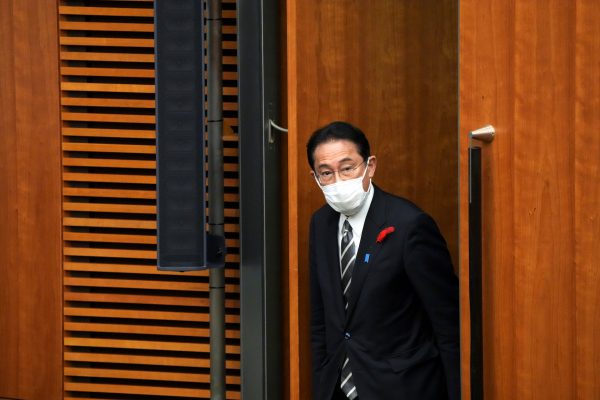 Japanese Prime Minister Fumio Kishida walks for a news conference at the prime minister's official residence in Tokyo, Japan, 14 October 2021 (Eugene Hoshiko/Pool via REUTERS)