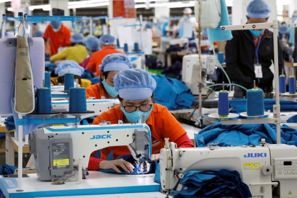 Labourers work at Hung Viet garment export factory, Hung Yen province, Vietnam, 30 December 2020 (Photo: Reuters/Kham).