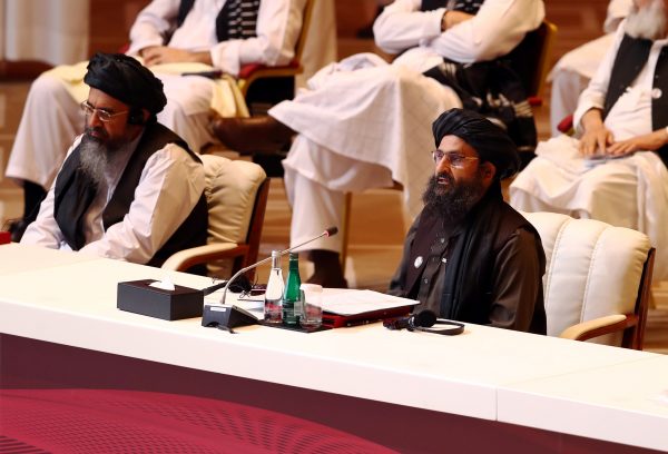 Mullah Abdul Ghani Baradar, the leader of the Taliban delegation, speaks during talks between the Afghan government and Taliban insurgents in Doha, Qatar, 12 September 2020 (Photo: Reuters/Ibraheem al Omari).