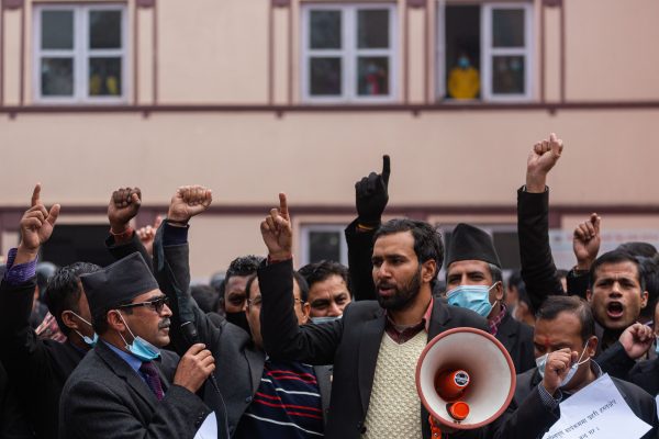 Judicial professionals and lawyers chant slogans during a protest demanding resignation of Chief Justice Cholendra SJB Rana on the premises of the Supreme Court in Kathmandu, Nepal, 9 November 2021 (Photo: Reuters/Rojan Shrestha)