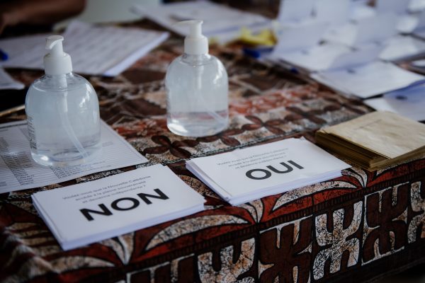 185,004 New Caledonian voters are called to vote for the third and last time to answer the question: Do you want New Caledonia to become fully sovereign and independent? A voting station at the Noumea City Hall, Noumea, New Caledonia, 12 December 2021. (Photo: Reuters/Delphine Mayeur/Hans Lucas).