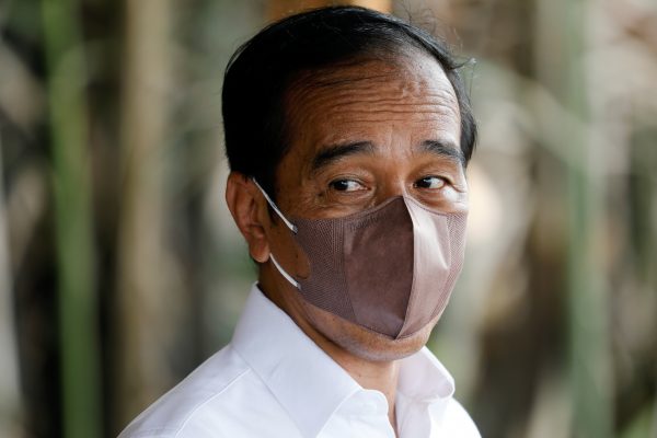 Indonesian President Joko Widodo looks on wearing a protective face mask during an interview in Bebatu, near Tarakan, North Kalimantan province, Indonesia, 19 October 2021 (Photo: Reuters/Willy Kurniawan).