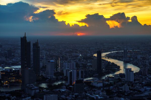 The skyline with Chao Phraya River is photographed during sunset in Bangkok, Thailand, 2 June 2021 (REUTERS/Athit Perawongmetha via Reuters Connect)