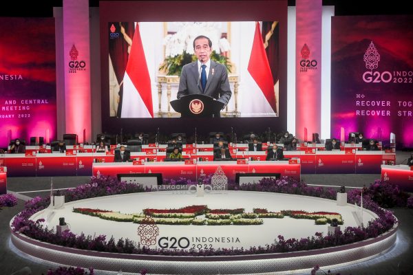 Indonesia President Joko Widodo is seen on a screen delivering his speech during G20 finance ministers and central bank governors meeting (FMCBG) at Jakarta Convention Center, Jakarta, Indonesia, 17 February 2022 (Photo: Hafidz Mubarak A/Pool via Reuters).