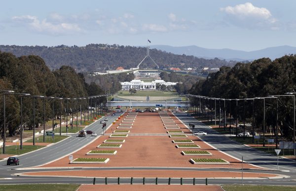 Australia's Parliament House (top) is visible above the old Parliament House (white building below) and Anzac Parade (foreground) in Canberra, 11 September 2012 (Photo: Reuters/Tim Wimborne)