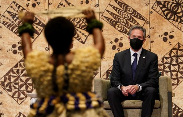 US Secretary of State Antony Blinken watches a cultural farewell ceremony during his visit to Nadi, Fiji, 12 February 2022 (Photo: Reuters/Kevin Lamarque/Pool).