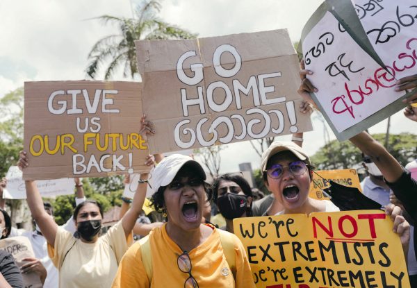 People shout slogans against Sri Lanka's President Gotabaya Rajapaksa and demand that Rajapaksa family politicians step down, during a protest amid the country's economic crisis at Independence Square in Colombo, Sri Lanka, 4 April 2022 (Photo: Reuters/Dinuka Liyanawatte).