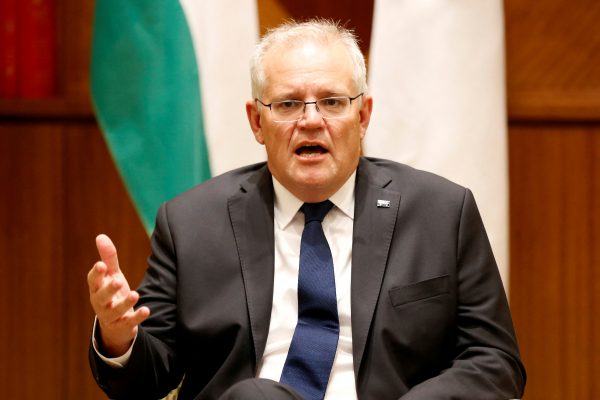 Australian Prime Minister Scott Morrison speaks to the media at Melbourne Commonwealth Parliament Office, in Melbourne, Australia, 11 February 2022 (Photo: Darrian Traynor/Pool via Reuters).