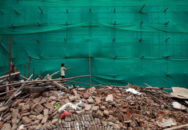 Workers work on the rebuilding site at Bashantapur Durbar Square, a UNESCO world heritage site damaged during the 2015 earthquake, Kathmandu, Nepal, 25 April 2019 (Photo: Reuters/Navesh Chitrakar).
