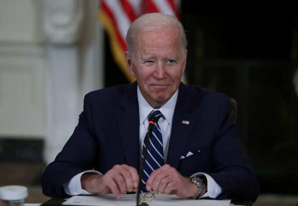 US President Joe Biden winks an eye in the State Dining Room in the White House in Washington, US, 29 April 2022 (Photo: Reuters/Evelyn Hockstein).