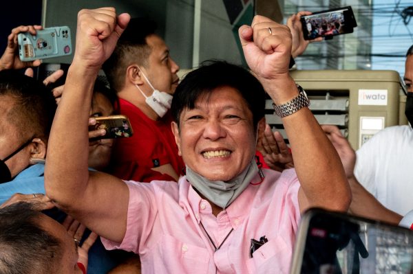 Philippine presidential candidate Ferdinand 'Bongbong' Marcos Jr., son of late dictator Ferdinand Marcos, greets his supporters at his headquarters in Mandaluyong City, Metro Manila, Philippines, 11 May 2022 (Photo: Reuters/Lisa Marie David).