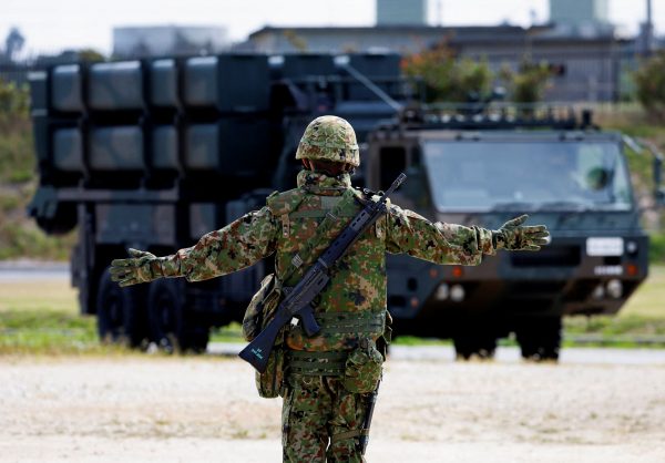 A member of the Japan Ground Self-Defense Force (JGSDF) conducts a military drill with an anti-ship missiles unit, at JGSDF Miyako camp on Miyako Island, Okinawa prefecture, Japan, 21 April 2022 (Photo: Reuters/Issei Kato).