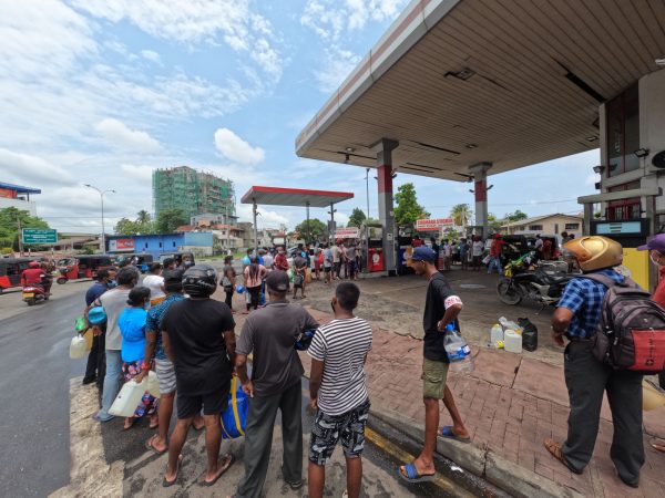 Sri Lankans wait in line at a fuel station. Sri Lanka’s president has declared a state of emergency for the second time in five weeks, giving security forces sweeping powers as a nationwide strike demanding his resignation brought the country to standstill, Colombo, Sri Lanka, 6 May 2022 (Photo: Reuters/Tharaka Basnayaka)