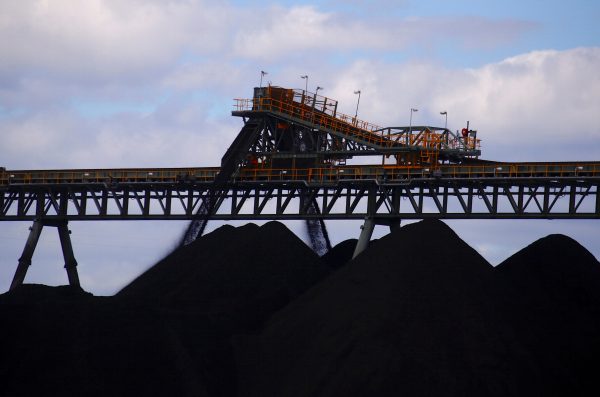 Coal is unloaded into large piles at the Ulan Coal mines near Mudgee, New South Wales, Australia, 8 March 2018 (PHOTO: David Gray via Reuters Connect)