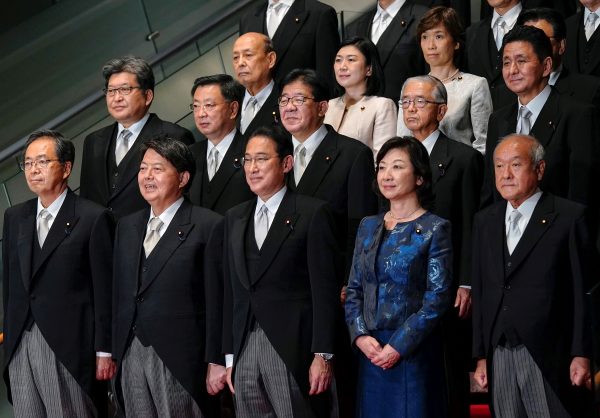 Japanese Prime Minister Fumio Kishida poses with newly appointed ministers at Prime Minister's official residence in Tokyo, Japan, 10 November 2021 (Photo: Reuters/Kimimasa Mayama)