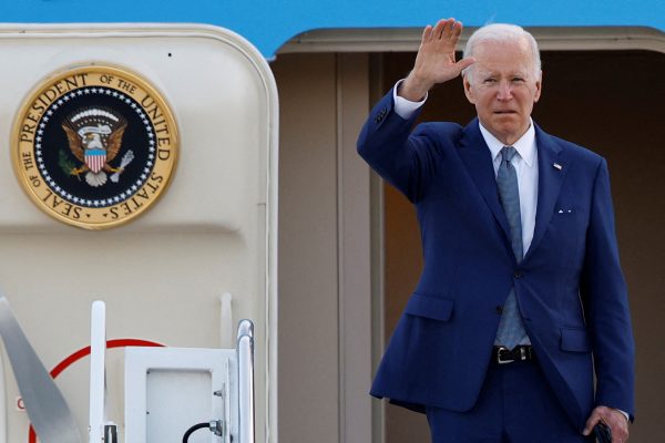 US President Joe Biden gestures as he boards Air Force One to depart from Yokota Air Base in Fussa, on the outskirts of Tokyo, Japan, 24 May 2022 (Photo: Reuters/Kim Kyung-Hoon).