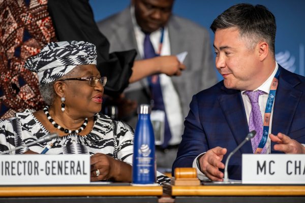 Director-General of the World Trade Organisation (WTO) Ngozi Okonjo-Iweala and MC12 Chair Mr Timur Suleimenov attend the opening ceremony of the 12th Ministerial Conference (MC12), at the headquarters of the World Trade Organization, in Geneva, Switzerland, 12 June 2022 (Photo: Reuters/Martial Trezzini).