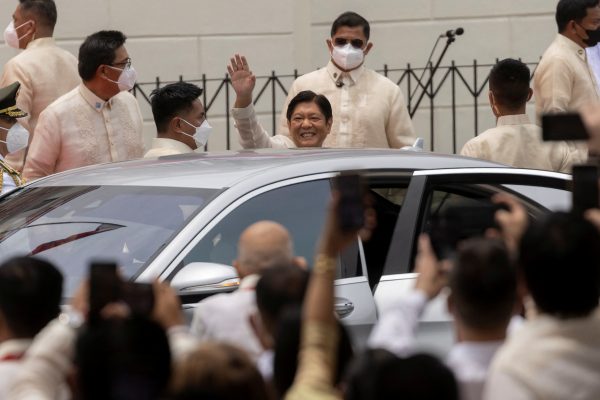 Newly-elected Philippines President Ferdinand 'Bongbong' Marcos Jr. waves upon arrival at his inauguration ceremony at the National Museum, Manila, Philippines, 30 June 2022 (Photo: Reuters/Eloisa Lopez).