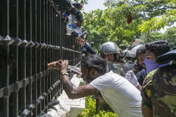 Sri Lankan protesters held a protest in front of the Prime Minister's Office, 13 July 2022 (Photo: Isura Nimantha/Pacific Press/Sipa USA via Reuters).