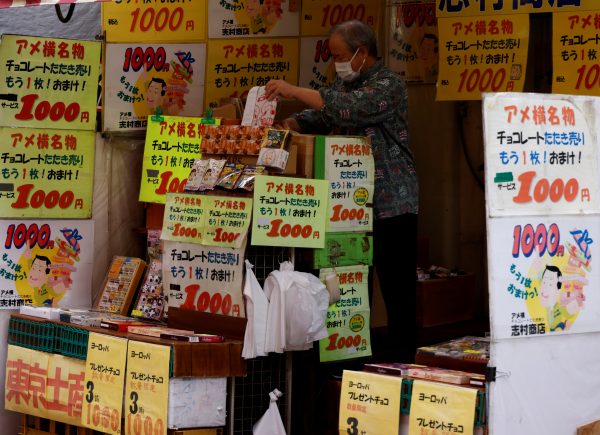 A vendor sells chocolates at a shop at the Ameyoko shopping district in Tokyo, Japan, 20 May 2022 (Photo: Reuters/Kim Kyung-Hoon).
