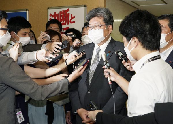 Koichi Hagiuda, policy chief of the ruling Liberal Democratic Party, meets the press at the LDP's headquarters after being reported to have visited a facility linked to the Unification Church, now known as the Family Federation for World Peace and Unification in Tokyo, 18 August 2022 (Photo: Reuters/Kyodo).