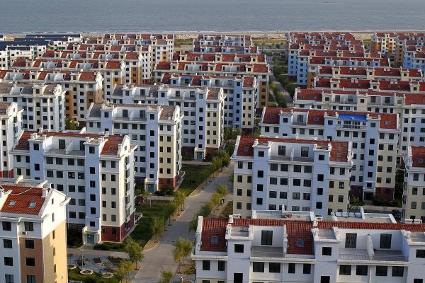 View of empty newly-constructed residential apartment buildings in Rushan city, China, 26 September 2013 (Photo: Reuters/Oriental Image)