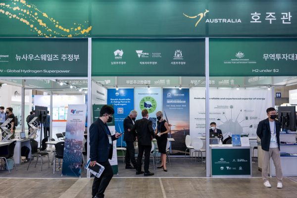 Visitors look at an exhibition booth displayed by Australia during the H2 MEET 2022 expo in Goyang city, South Korea on 31 August 2022 (Photo: Reuters/Chris Jung)