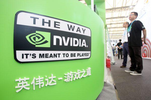 People visit the stand of NVIDIA during the 11th China Digital Entertainment Expo and Conference, known as ChinaJoy 2013, in Shanghai, China, 25 July 2013 (Photo: Oriental Image via Reuters).