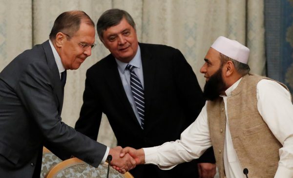 Russian Foreign Minister Sergei Lavrov welcomes member of Taliban delegation Alhaj Mohammad Sohail Shaina during the multilateral peace talks on Afghanistan in Moscow, 9 November 2018. (Photo: Reuters/Sergei Karpukhin