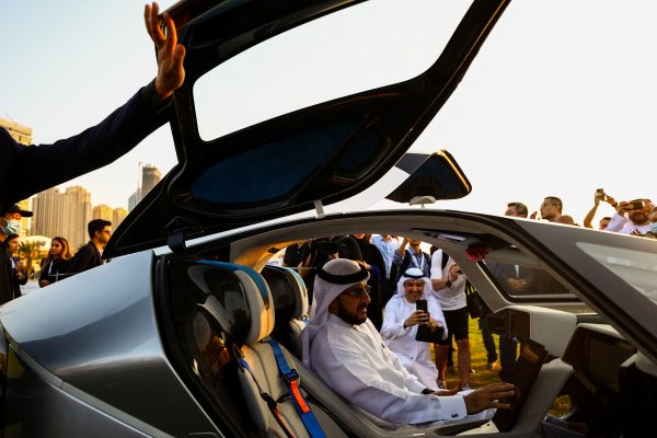 Guests and reporters check out the XPeng eVTOL flying car X2 in Dubai, United Arab Emirates, 10 October 2022 (Photo: Reuters/Amr Alfiky).