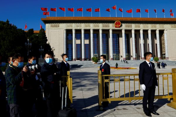 Security personnel keep watch outside the Great Hall of the People before the closing ceremony of the 20th National Congress of the Communist Party of China in Beijing, China, 22 October 2022. (Photo: Reuters/Tingshu Wang).