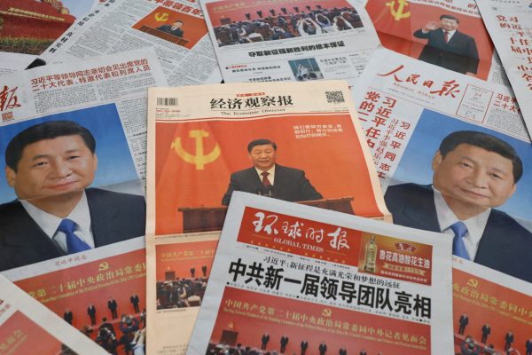 Newspaper reports on the new Politburo Standing Committee, Beijing, China, 24 October 2022 (Photo: REUTERS/Florence Lo).